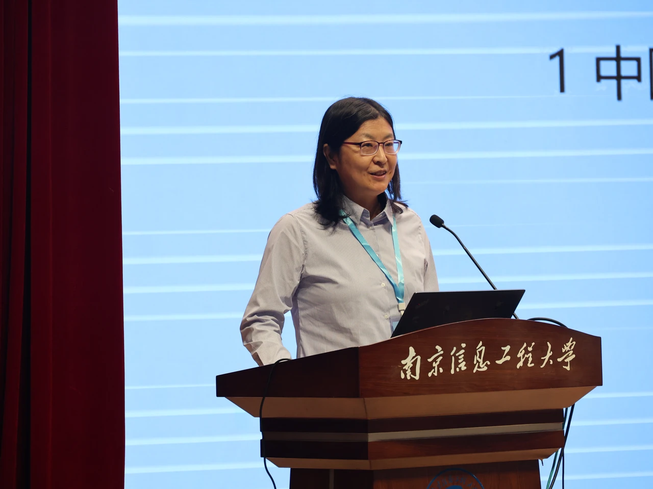 Aihui Wang gives a presentation.