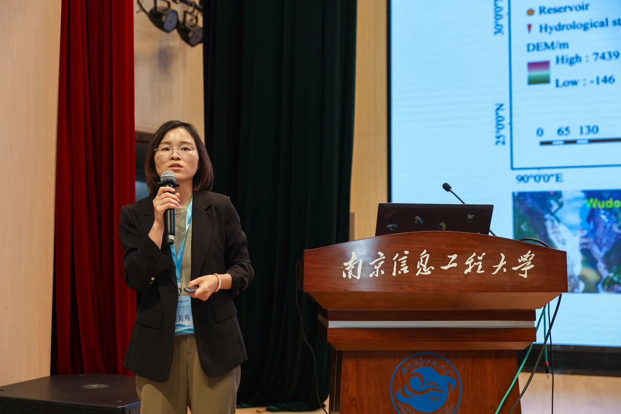 Meixiu Yu gives a presentation.