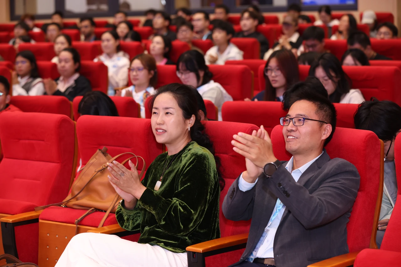 Participants respond to a conference presentation.
