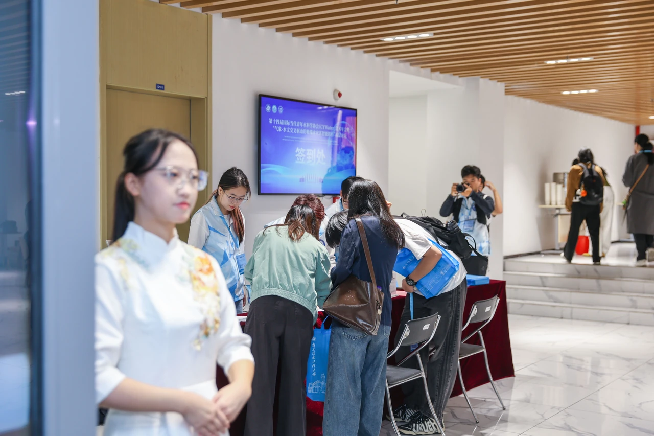 The volunteer team supports registration and guest reception.